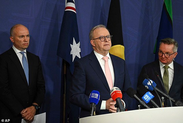 102265719-15112671-Prime_Minister_Anthony_Albanese_center_addresses_a_press_confere-a-10_17582335583.jpeg