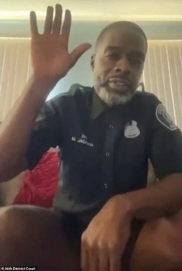 103432229-15240135-Detroit_Police_Officer_William_Jackson_appeared_in_a_livestreame-a-1_176179544064.jpeg