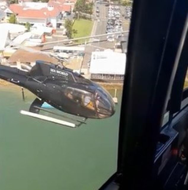 104132753-15320011-Harrowing_footage_of_the_moment_two_Sea_World_helicopters_crashe-a-4_176396408868.jpeg