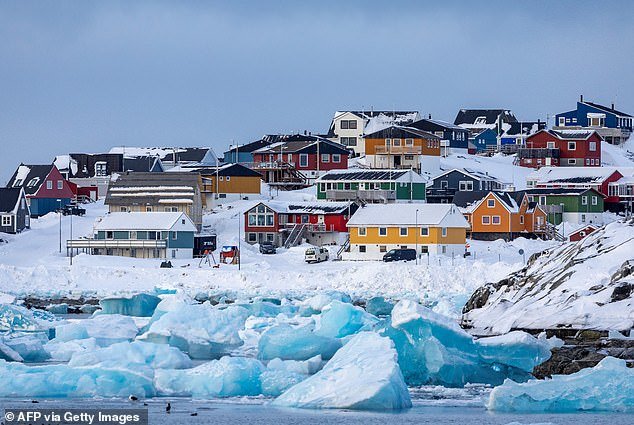 105387291-15450199-Colorful_houses_line_the_snowy_coast_of_Nuuk_the_capital_city_of-a-5_176802173804.jpeg