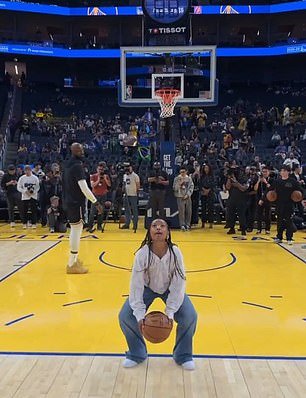 LeBron James queda eclipsado por su hija Zhuri, de 11 años, mientras realiza un truco ridículo en la cancha antes del partido de los Lakers.