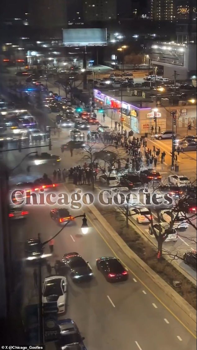 Turistas horrorizados que visitan Chicago se enfrentan a la escena de pesadilla de Mad Max que se desarrolla fuera de la ventana de su habitación del hotel Hampton Inn.